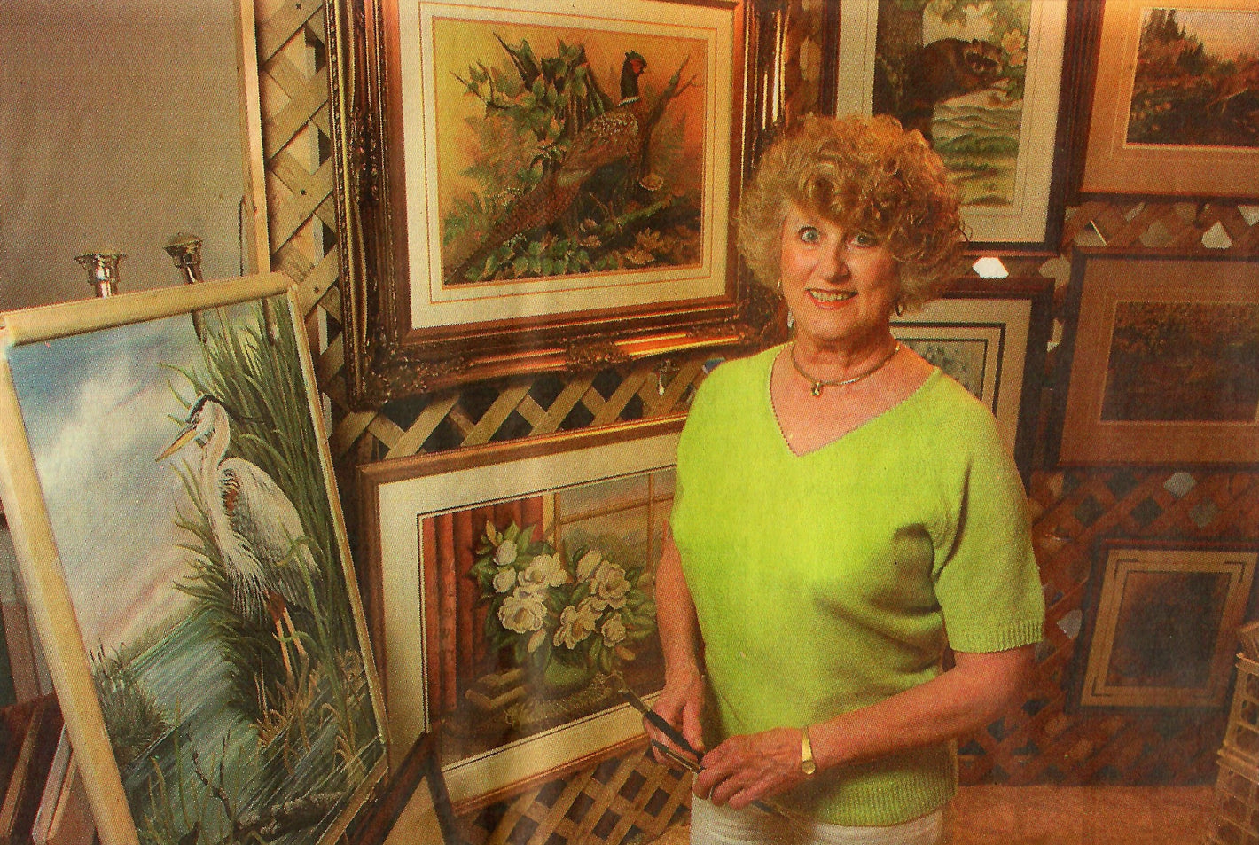 L Marie Nichols studio with original watercolor paintings